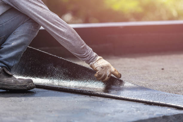Professional Basement Waterproofing technician working in Columbiana, AL